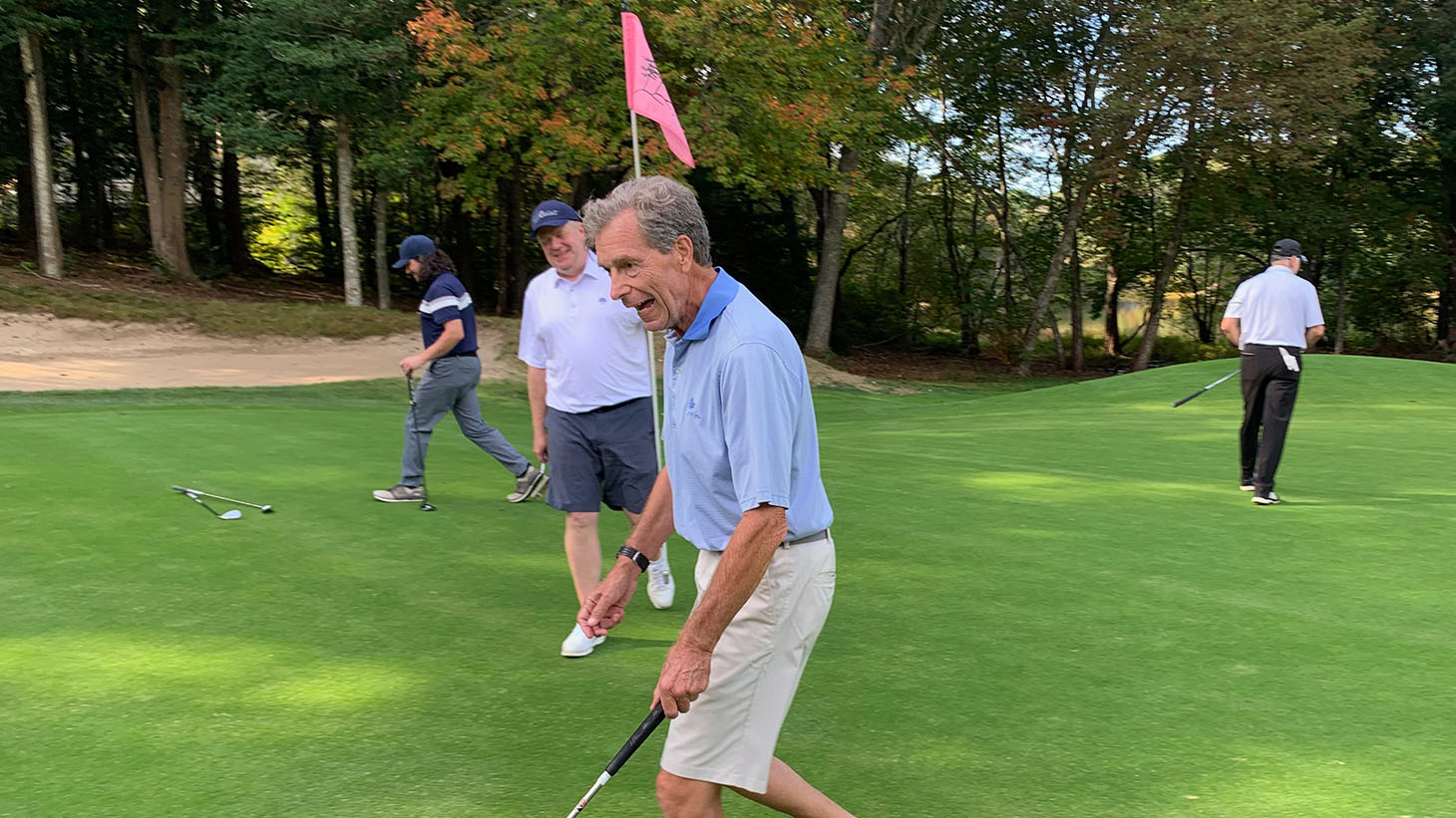 Mike S. is all smiles after a great putt on the...